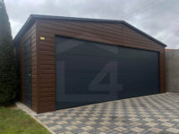 Garaż blaszany dwuspadowy 6 m x 5,8 m Orzech z bramą segmentową Grafit widok od frontu